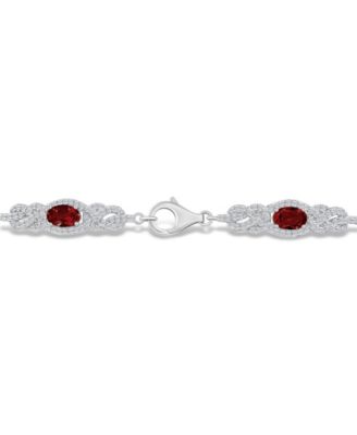 Garnet (3 1/2 ct. t.w.) and Topaz (2 1/10 ct. t.w.) Bracelet in Sterling Silver
