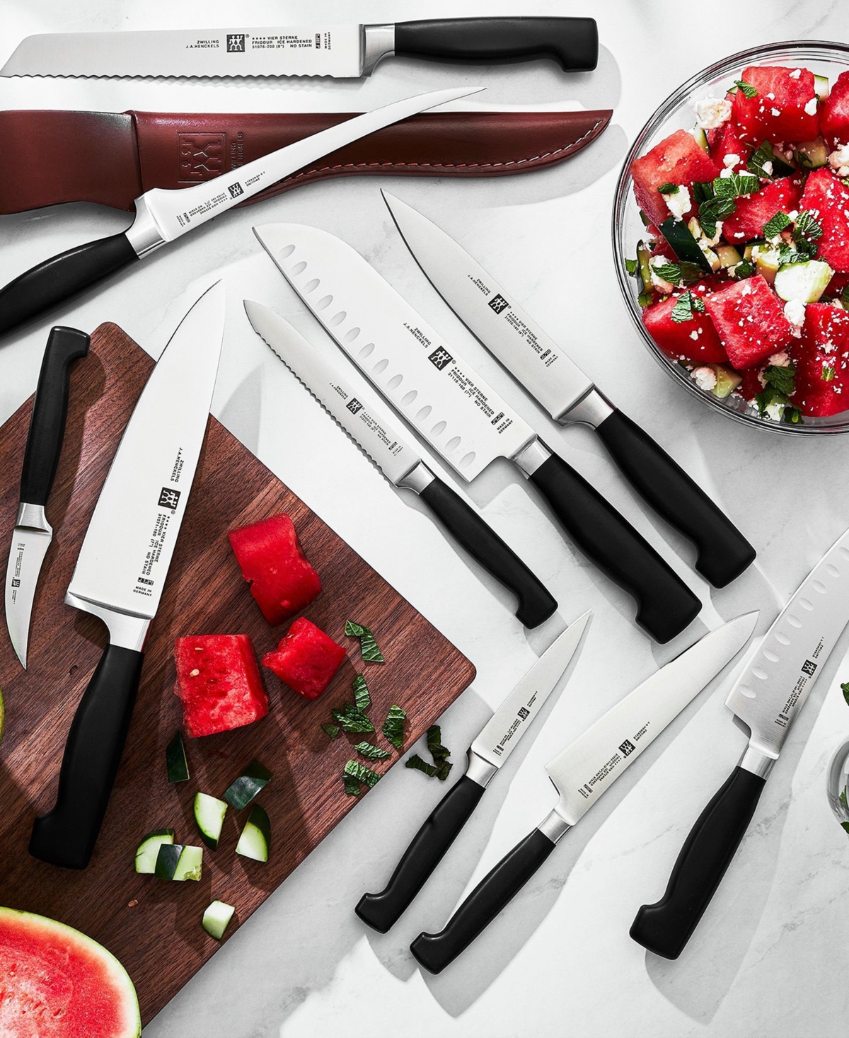 Zwilling Four Star 7-inch Hollow Edge Santoku Knife In Black