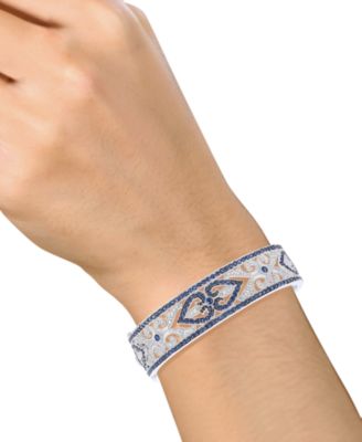 Sterling Silver Bracelet, Sapphire (3-3/4 ct. t.w.) and Diamond (1/4 ct. t.w.) Heart Bangle (Also Available in Ruby)