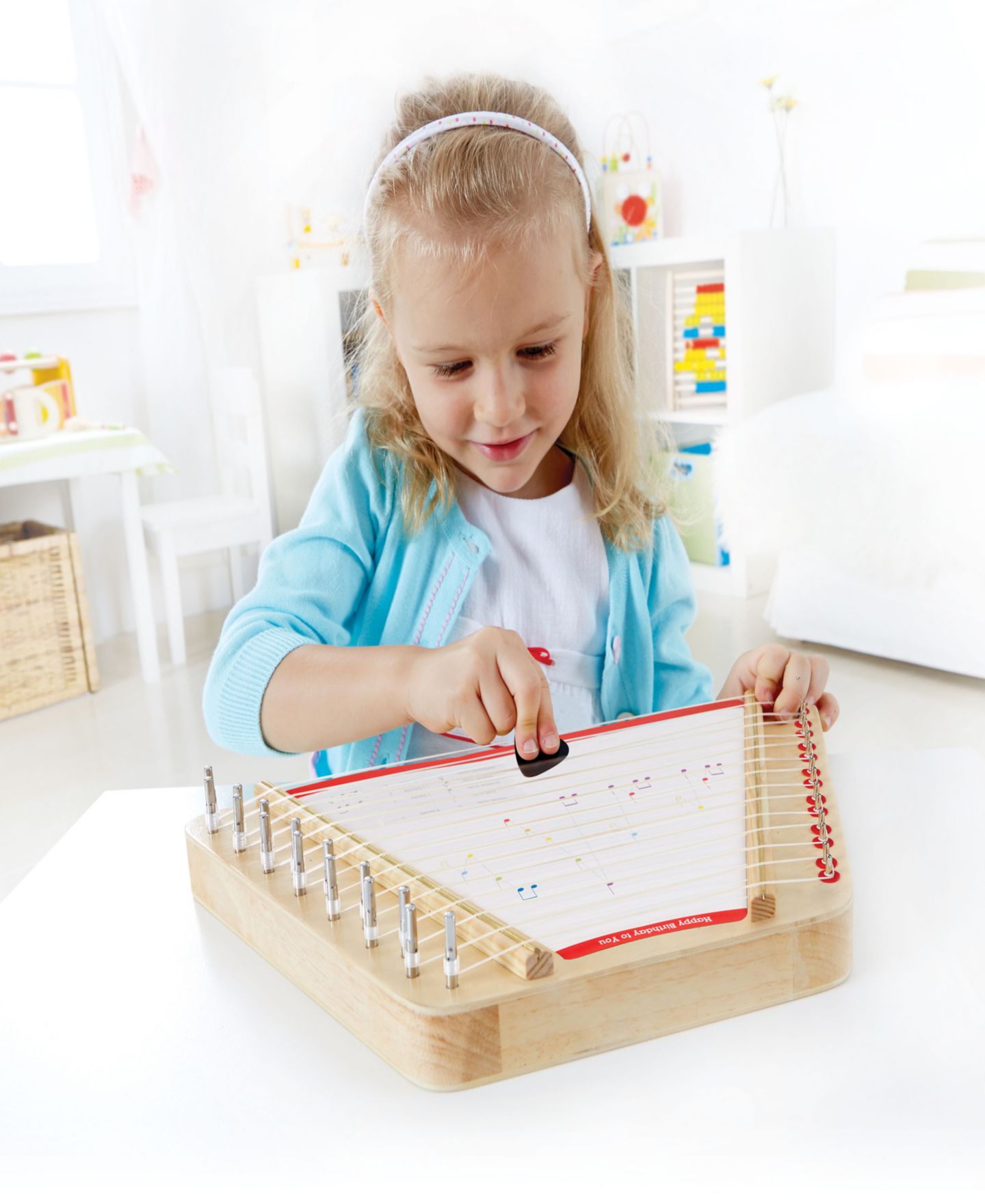 Музыкальная игрушка Hape Early Melodies Happy Harp — фото 6