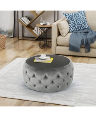 velvet design with diamond tufting and a tempered glass top is offered as a modern glam ottoman