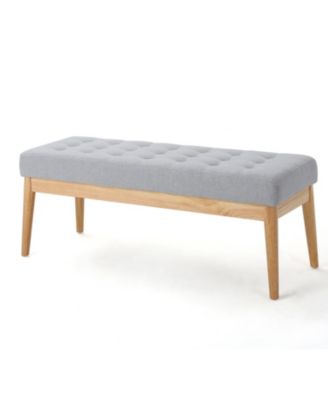tufted upholstered design with mid-century modern charm is offered as a stylish bench