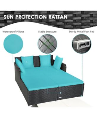 Spacious Outdoor Rattan Daybed with Upholstered Cushions and Pillows