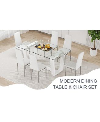 Table and chair set.A rectangular dining table features with tempered glass top and sleek white MDF stand.Paired with 6 PU chairs with checkered armless high back and electroplated metal legs.