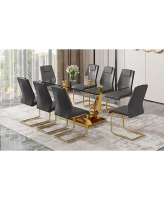 Table and chair set.Modern rectangular dining table with Transparent tempered glass tabletop and gold plated metal legs.Paired with 8 comfortable chairs with PU seats and golden metal legs.