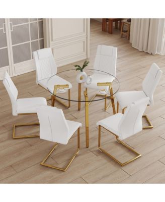Table and chair set.A Modern Minimalist Style Round Clear Tempered Glass Table with Metal Legs.Paired with white chairs with Modern PU Leather High Back Upholstered and C-Tube Golden Legs.