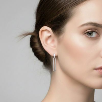 Sterling Silver with Clear Cubic Zirconia Pave Accents Oval Drop Earrings in White Gold Plated or 14K Gold Plated