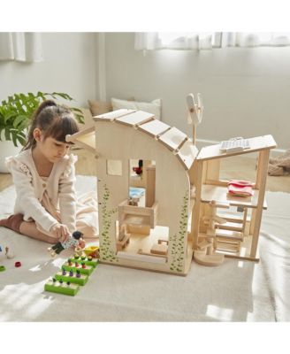 GREEN DOLLHOUSE W/ FURNITURE