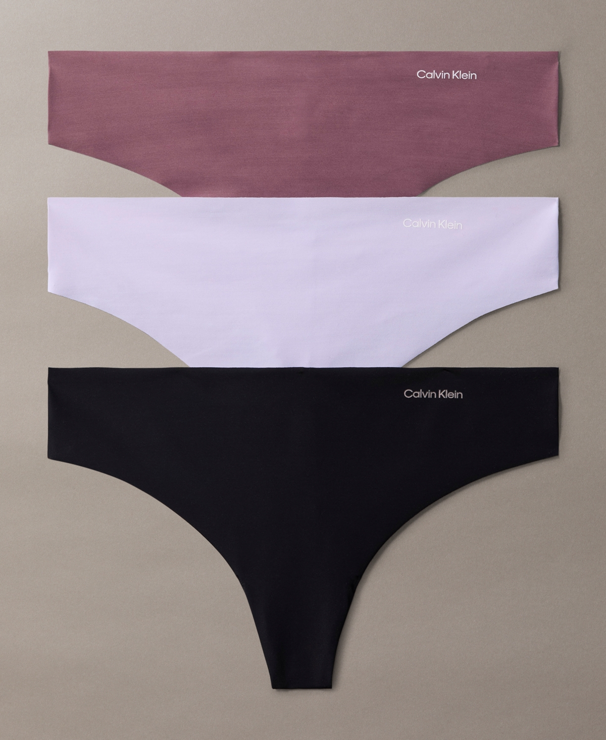 Shop Calvin Klein Women's Invisibles 3-pack Thong Underwear Qd3558 In Black,cinder,lilac Quartz