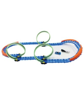 R/C  car and track with three loops and glow trace technology.