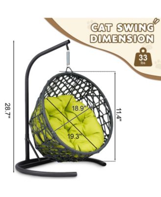 This rattan cat swing bed with cushion and stand provides a cozy swinging space for cats and small pets offering comfort and relaxation indoors