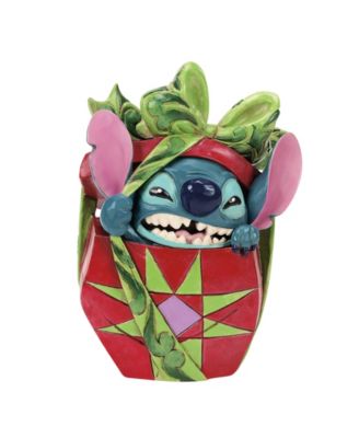 Stitch Tearing Present Figurine