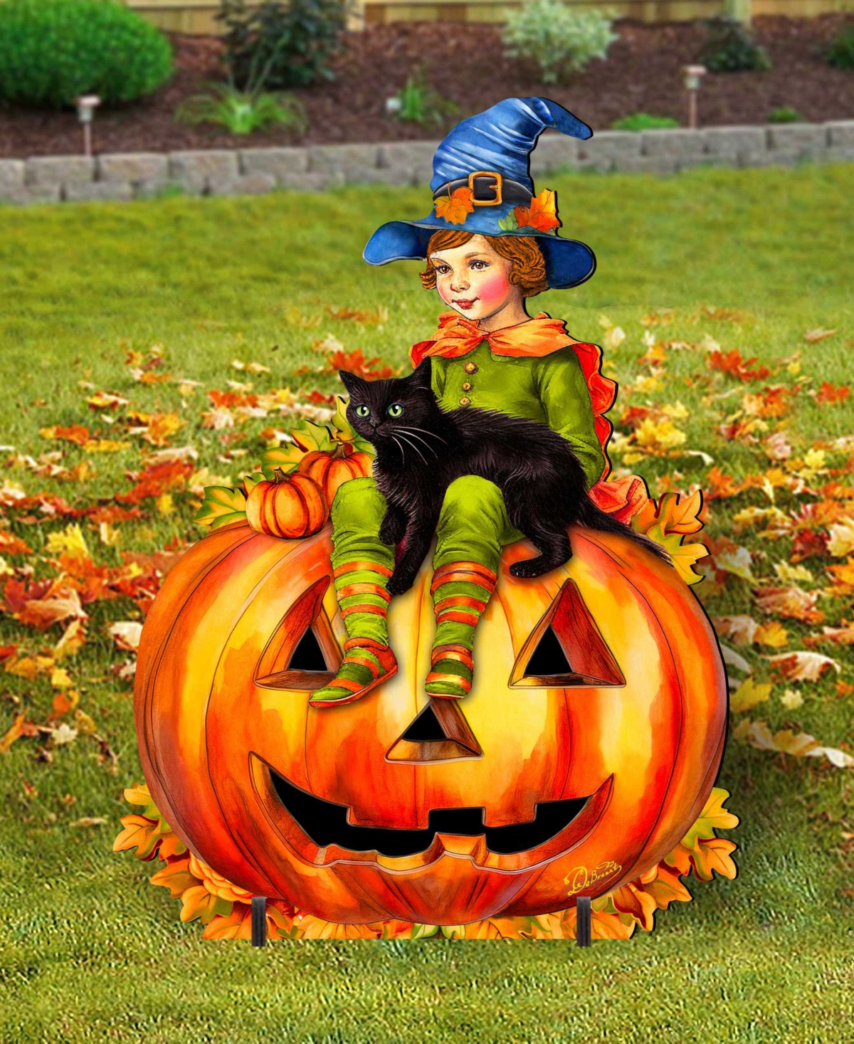 Designocracy Boy On Pumpkin Outdoor Decor In Multi