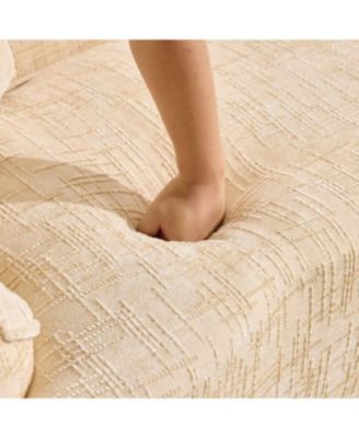 Beige curved two-person compress sofa with armrests and two pillows.