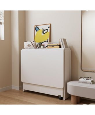 Foldable 51.18" white table for small families display or home use.