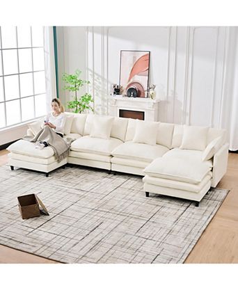 U-shaped modular sectional sofa with 2 ottomans, 4 cushions, 2 pillows. Beige