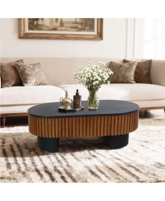 Elliptical coffee table with storage