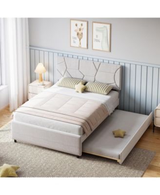 full upholstered trundle bed with pull-out platform and wood slats for space-saving use