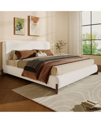 Elegant white queen upholstered bed with dark brown solid wood legs