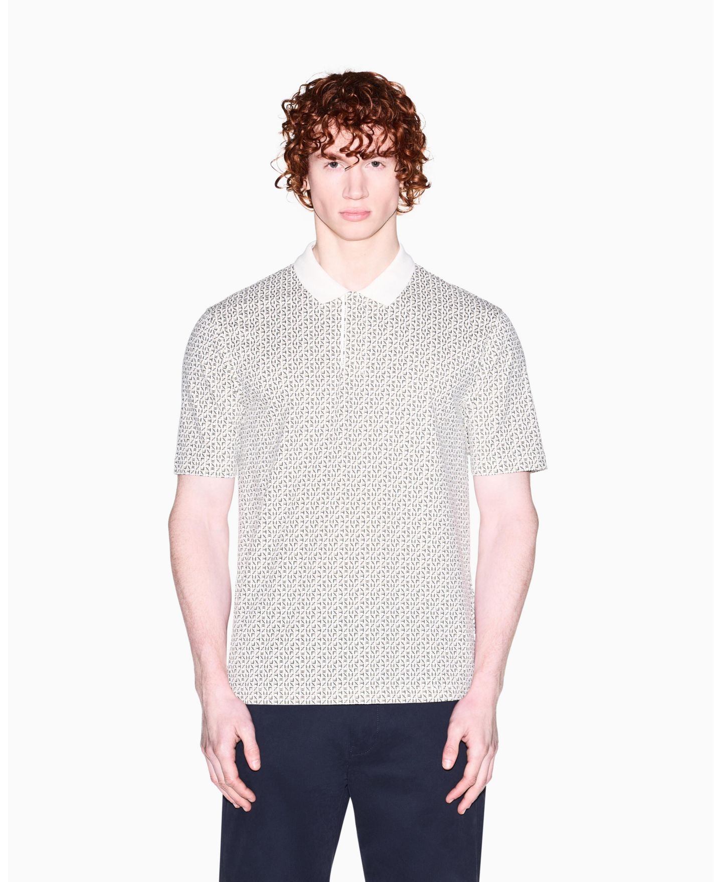 Мужское поло A|X Armani Exchange Pique Allover Logo Print Polo Shirt, цвет: Кремовый с принтом — фото 1