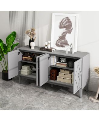 Vintage 4-door cabinet with hand-carved geometric doors and adjustable shelves