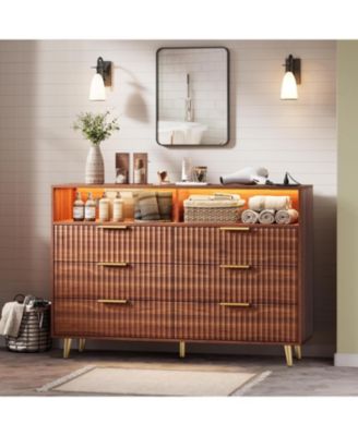 6 Drawer Dresser with LED Lights and Charging Station, Fluted Wood Design, Handles, and Open Shelf Storage for Any Room.