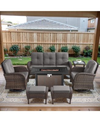 7-Piece Outdoor Wicker Nighttime Conversation Set for Family and Cozy Backyard Nights with Sofa, Swivel Rocking Chairs and Ottomans