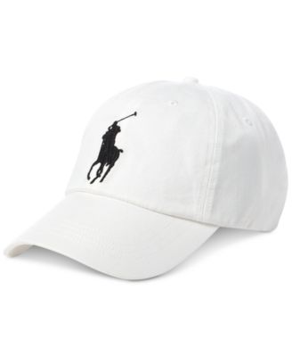 white and black polo hat