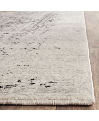 Evoke EVK260 Ivory and Black 5'1" x 7'6" Area Rug