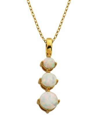 gold necklace with stone pendant