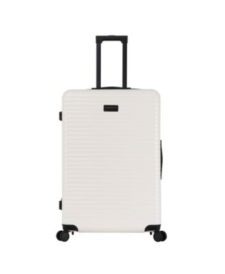 white luggage with tan trim