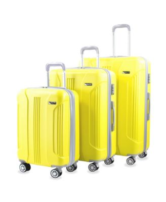 yellow hard shell luggage