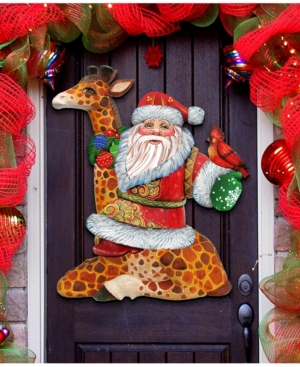 Designocracy Santa On Giraffe Christmas Door Hanger In Multi