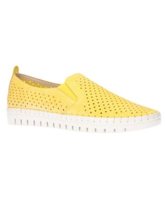 yellow slip on sneakers