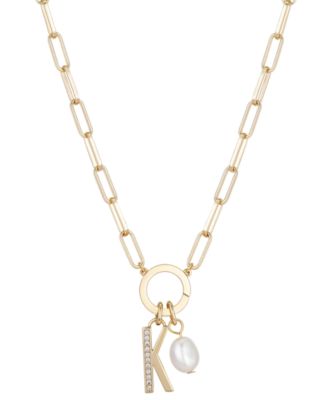 Photo 1 of UNWRITTEN Cubic Zirconia Initial & Freshwater Pearl 18" Pendant Necklace in Gold Plate
Freshwater pearl: 6mm
Set in fine silver plate or 14k gold flash-plated metal; cubic zirconia
Approx. length: 18"; approx. drop: 3/4"
Spring ring closure