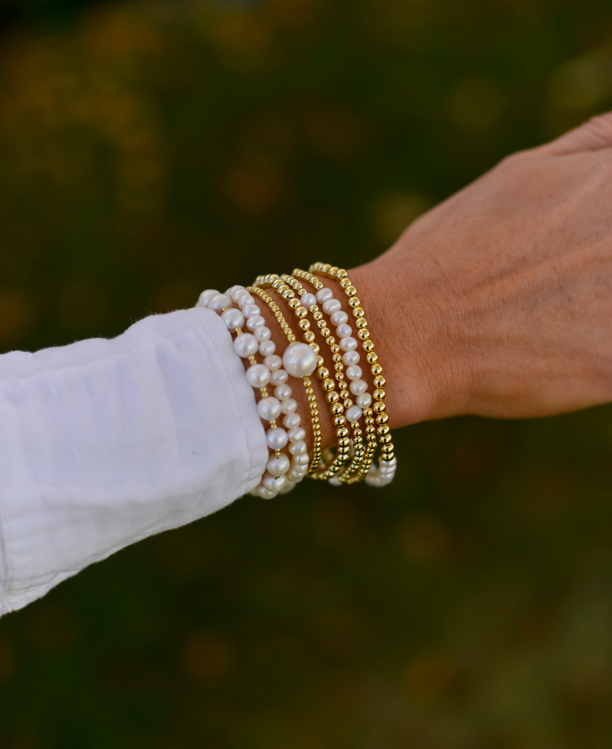 Cultured Freshwater Pearl (4-1/2 - 5mm) & Polished Bead Station Stretch Bracelet in 18k Gold-Plated Sterling Silver