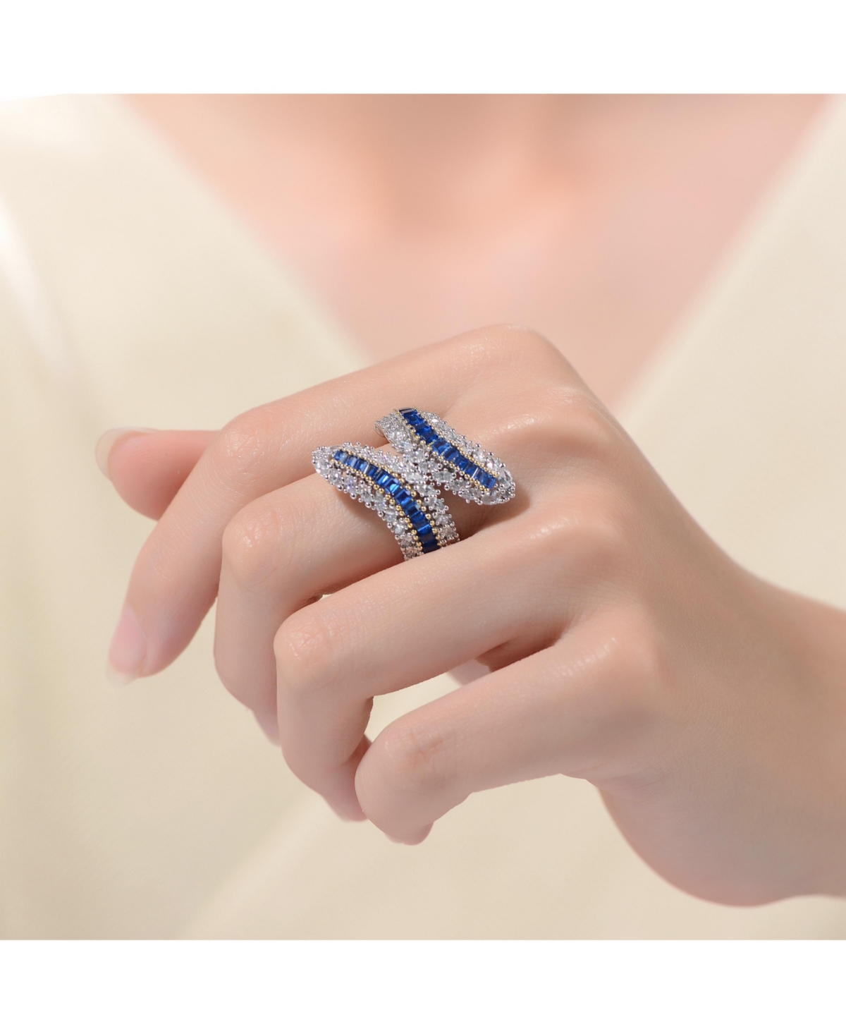 Genevive Elegant Sterling Silver Bypass Ring with Rhodium Plating andCubic Zirconia - Blue