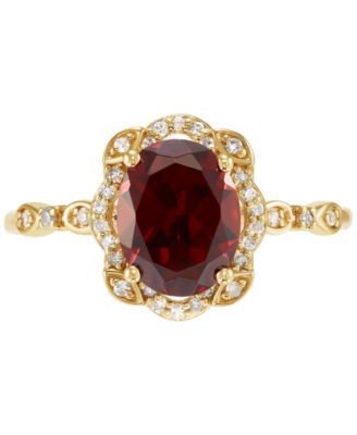 Garnet (2-1/4 ct. t.w.) & Diamond (1/8 ct. t.w.) Halo Ring in 14k Gold