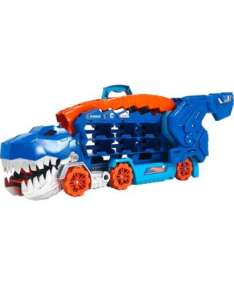 Hot Wheels City Ultimate Hauler, Transforms Into A T-Rex with Race