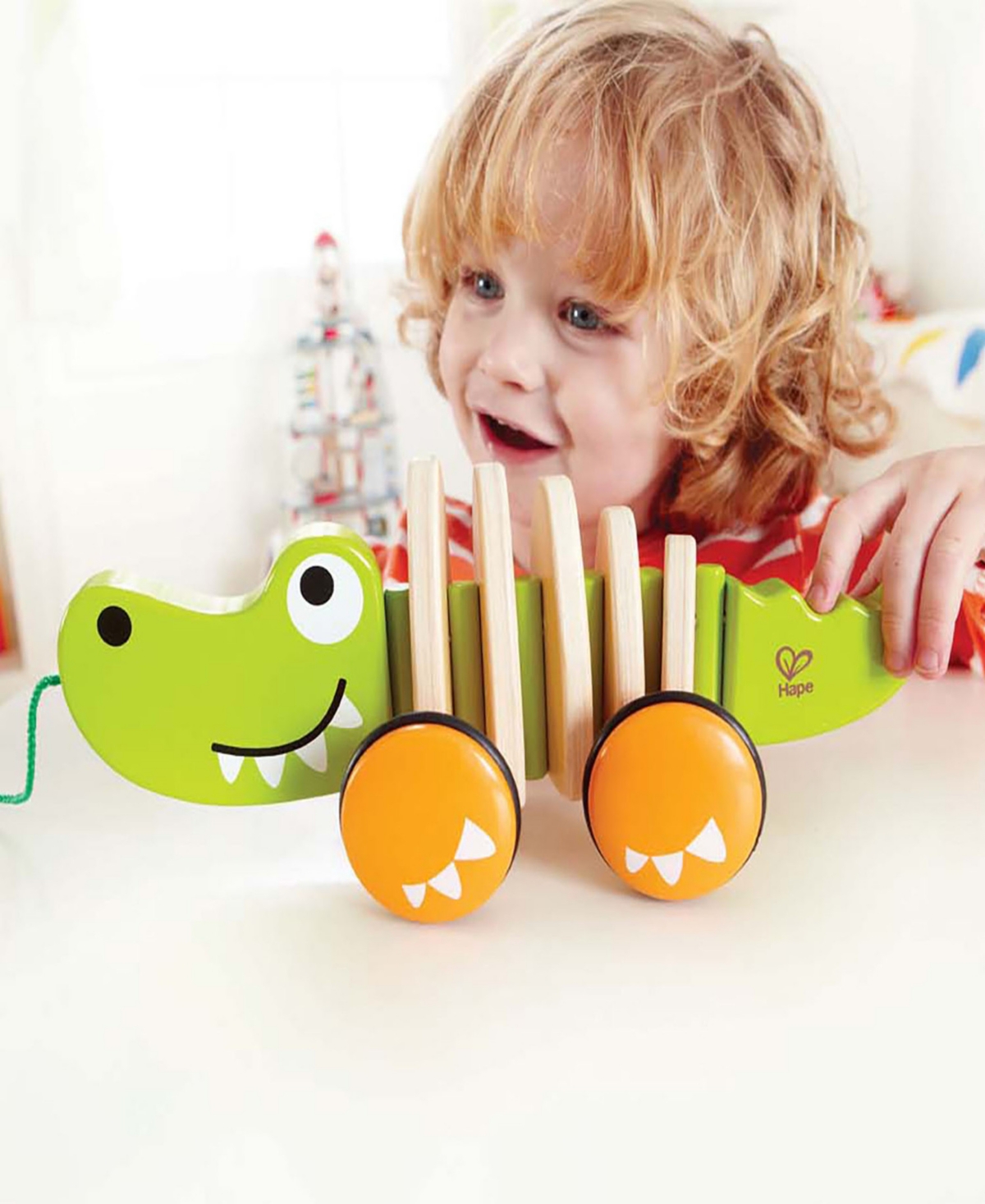 Shop Hape Walk-a-long Croc Toddler Toy In Multi