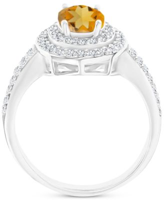 Amethyst (1-1/20 ct. t.w.) & Lab-Grown White Sapphire (3/4 ct. t.w.) Oval Halo Birthstone Ring in Sterling Silver (Also in Additional Birthstones)