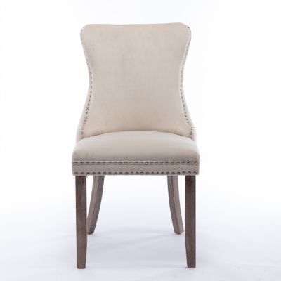 2 Beige Wingback Dining Chairs with Nailhead Trim & Wood Legs