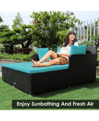 Spacious Outdoor Rattan Daybed with Upholstered Cushions and Pillows