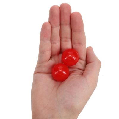 Old-Fashioned Metal Jacks in a Wooden Box