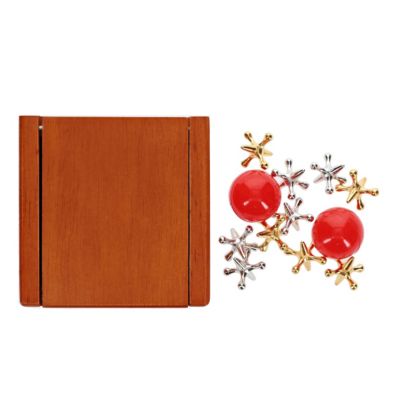 Old-Fashioned Metal Jacks in a Wooden Box