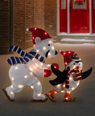 41.25" Lighted Ice-Skating Polar Bear and Penguin Outdoor Christmas Decoration