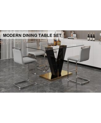 Table and chair set. A rectangular glass dining table with a 0.4-inch tempered glass tabletop and MDF board V-shaped bracket, paired with chairs consisting of PU seat cushions and silver metal legs.
