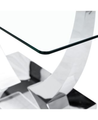 Table and chair set.Contemporary, minimalist rectangular dining table featuring a clear tempered glass top and sleek silver legs. Paired with chairs made of PU material cushion and silver metal legs.