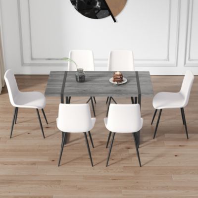 Table and chair set, textured top in vintage retro grey wood grain desktop, black metal legs. Dining chair with white faux leather backrest cushion with black metal legs.