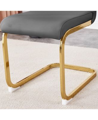 Table and chair set.Modern rectangular dining table with black textured stickers glass tabletop and gold plated metal legs.Paired with 4 comfortable chairs with PU seats and golden metal legs.